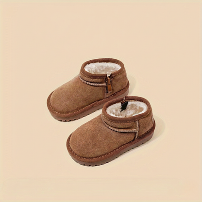 TinyStep Boots  Soft, warm everyday boots — for boys and girls.
